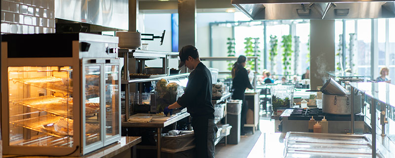 Workers in a cafe venue
