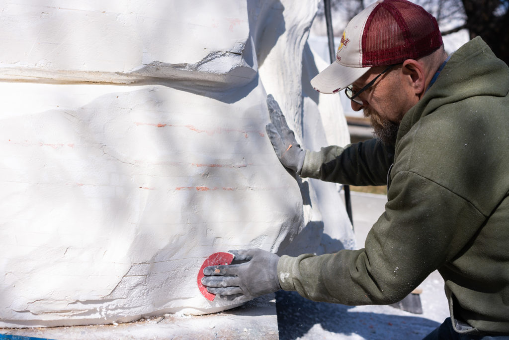 Cory Clawson works on wildlife sculptures